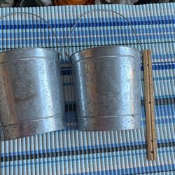 2 Hanging 1/2 rustic buckets