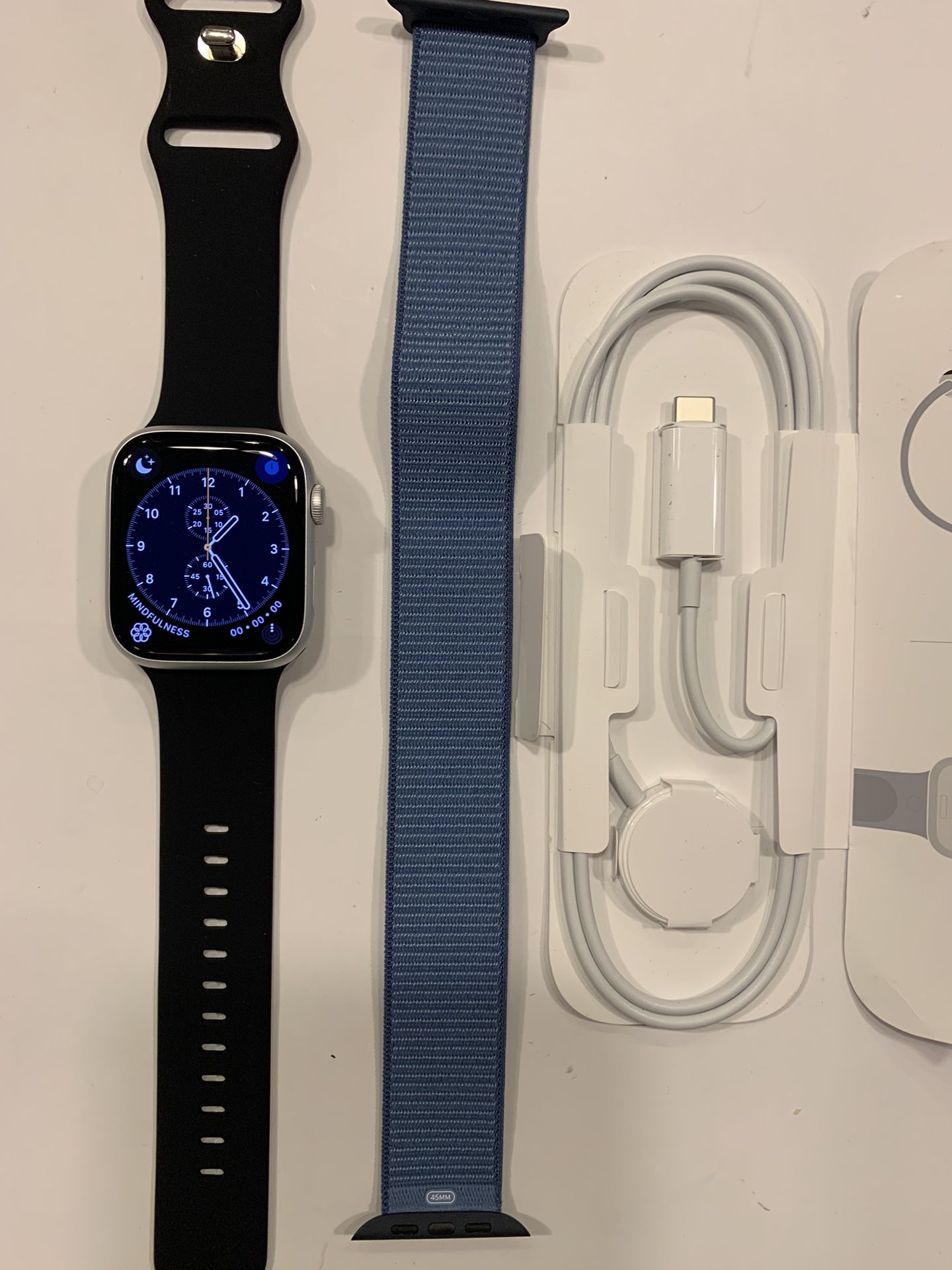 Brand NEW Apple Watch Series 9 GPS 45mm Silver With Winter Blue M/L Size Sport Loop  Comes with charger and  1 year Apple warranty