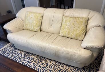Creamy white faux leather coach