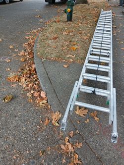 40 Ft Werner Ladder With Adjustable Legs.