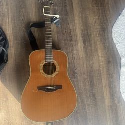 Acoustic guitar by takamine