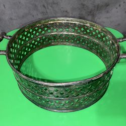 vintage silver-plated casserole dish holder made by the International Silver Company. It features a distinctive bamboo motif for the handles and a bas