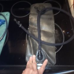 CamelBak 100oz/3L MG Long Neck Reservoir - Tactical Hydration Bladder - Leak-Proof Water Bladder - BPA-Free, Brown