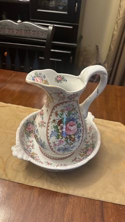 vintage porcelain floral pitcher and wash basin bowl set featuring a pink rose and multicolored floral pattern with gold gilt trim