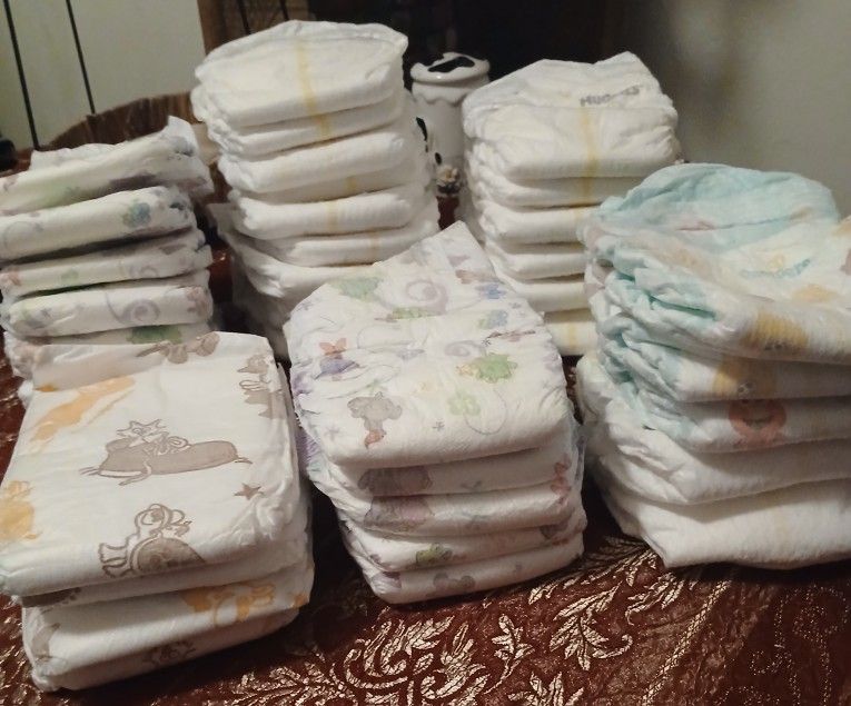 37 Mixed Brands Sz 1 Diapers