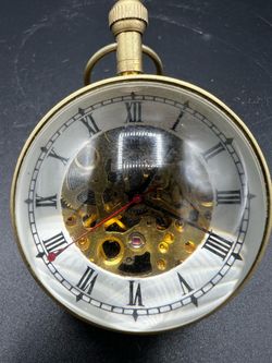 Vintage brass skeleton ball clock
