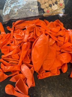 Latex balloons assorted sizes orange and green