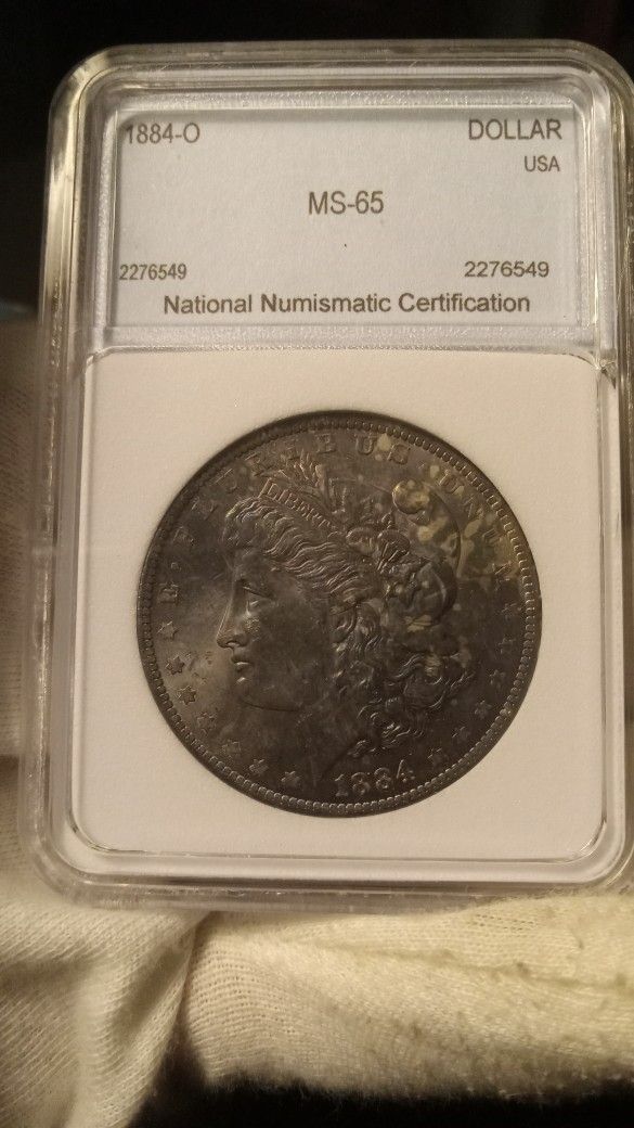 1884-O Morgan Silver Dollar NNC MS 65 New Orleans Mint Toned On Obverse