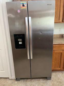 Whirlpool side by side refrigerator