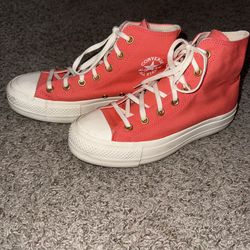 Converse Women's Chuck Taylor All Star Lift Platform High Top sneakers in a coral or "Watermelon Slushy" color