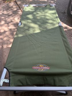 Camping cots by timber creek