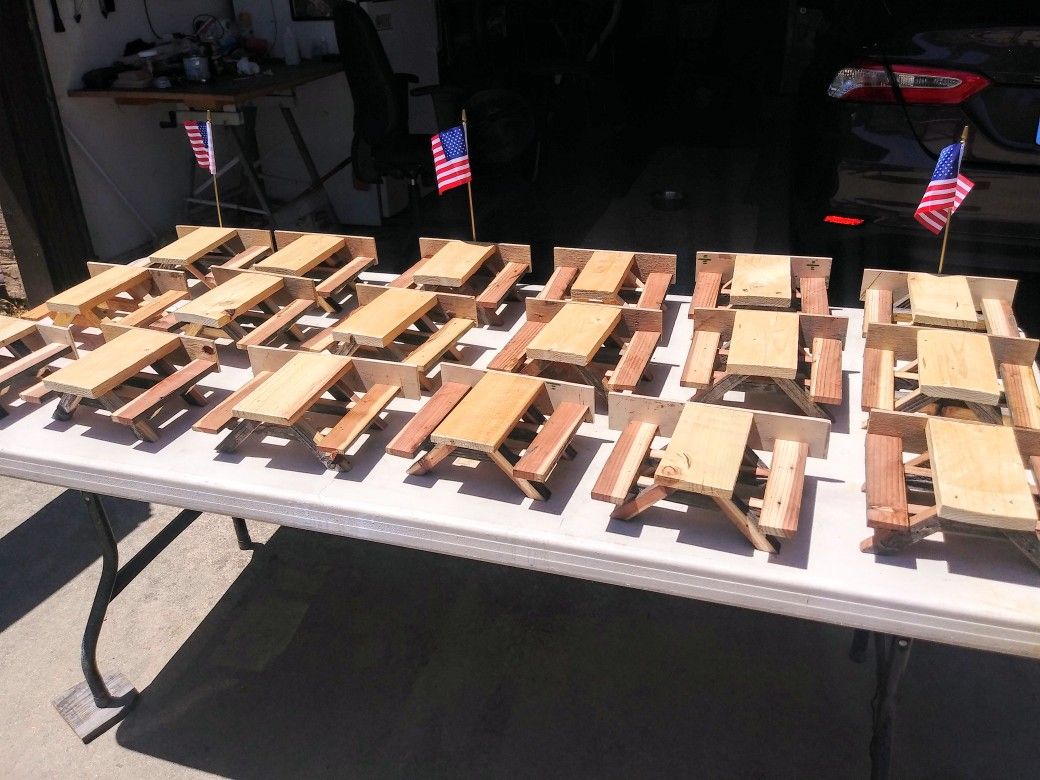 Rustic squirrel picnic tables