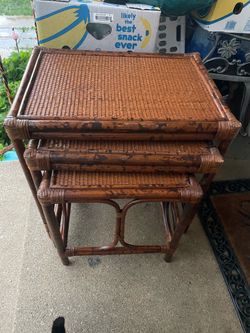 Set of three wicker tables