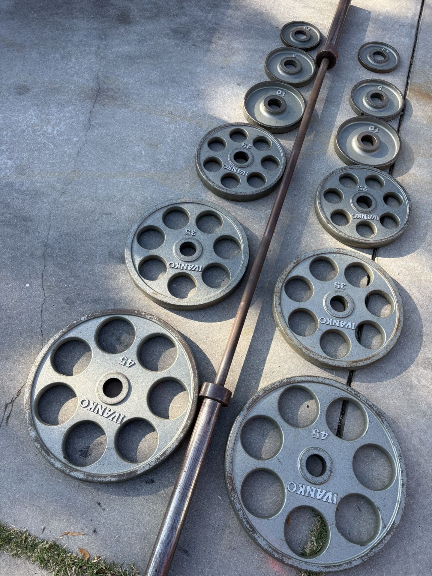 Ivanko revolvers machined Olympic weight plates 2 of each (45, 25, 35.10, 5, 2.5)