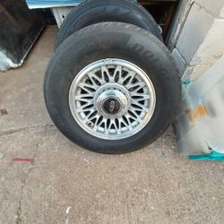 Set of Lincoln  Wheels.with only Three Hub Caps..pick Up at My Location  at One Block East Of Ave Q and Q...$250