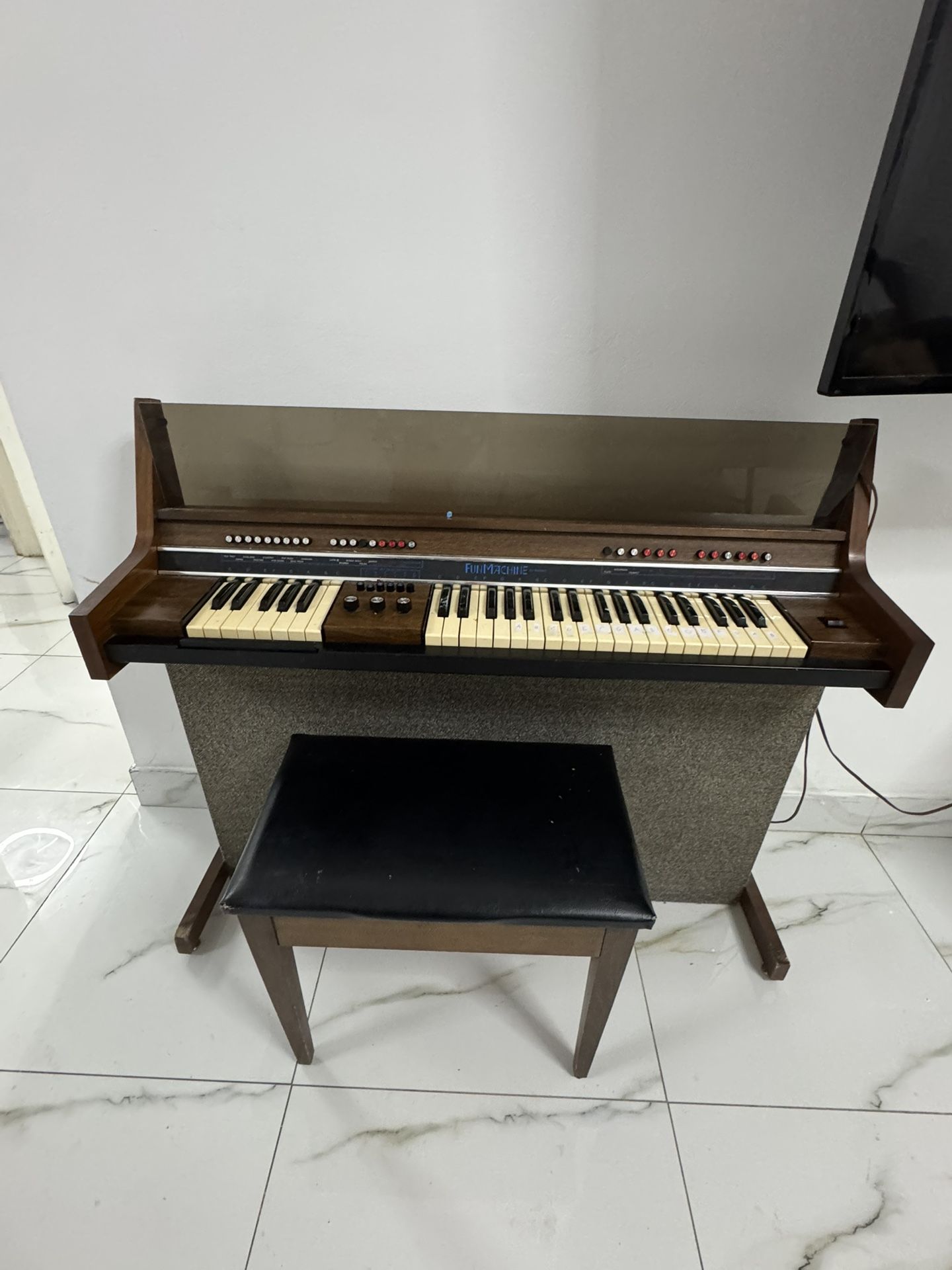 Piano and chair in excellent condition