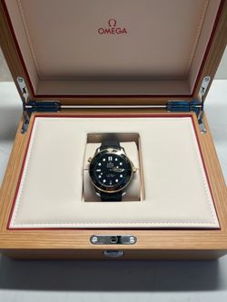 Omega Seamaster Black and 18k Gold