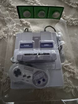 BRAND NEW HALLMARK SUPER NINTENDO ORNAMENT PLAYS MUSIC 