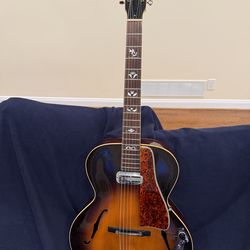 A $12000 Gibson Guitar only $5900!!!