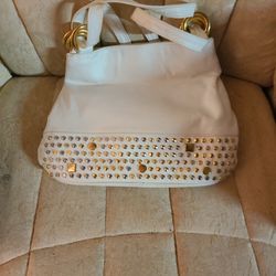 The icing White and gold leather purse