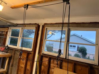 Kayak/canoe ceiling straps with pully system