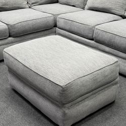 Jeromes Gray Sectional Couch with ottoman, deep cleaned. We deliver & setup.