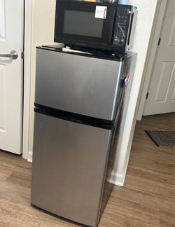 Combo of fridge and a microwave
