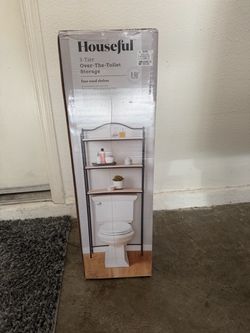 Still in the box. Over the toilet storage.