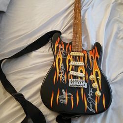 Guitar Signed By The Band AC/DC