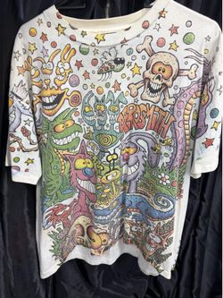 1993 Aerosmith all-over print T-shirt featuring cartoon artwork by artist Joey Mars.