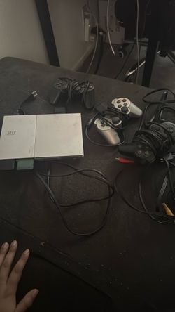 PlayStation 2 + games $150 obo
