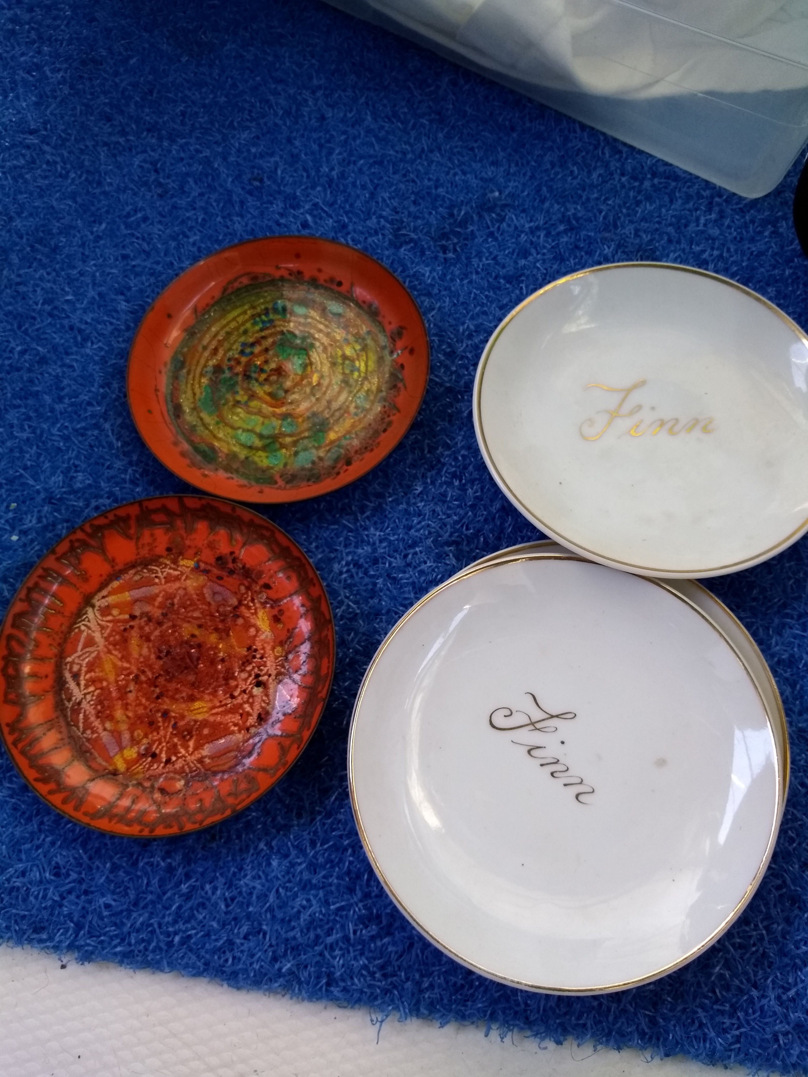 Antique little plates with Finn on front