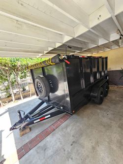 NEW DUMP TRAILER 12X8X4 12000 LBS
ROLLING TARP--SPARE TIRE,ELECTRIC BRAKES,HYDRAULIC SYSTEM,REMOTE CONTROL,IDEAL FOR HAULING, DEMOLITION, TRASH ETC,