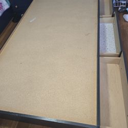 two Twin bed frames with 3 drawers underneath 
