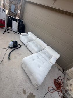 White/creme couch with ottoman