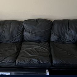 Black Faux leather sofa with pullout bed