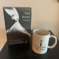 Fifty Shades of Grey Book trilogy and NWT coffee mug. Great gift .