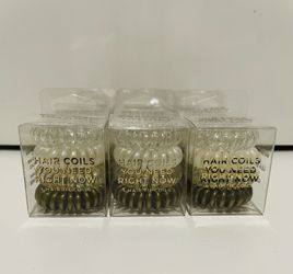 Lot of Kitsch Set of 4 Gold/Clear Hair Coils