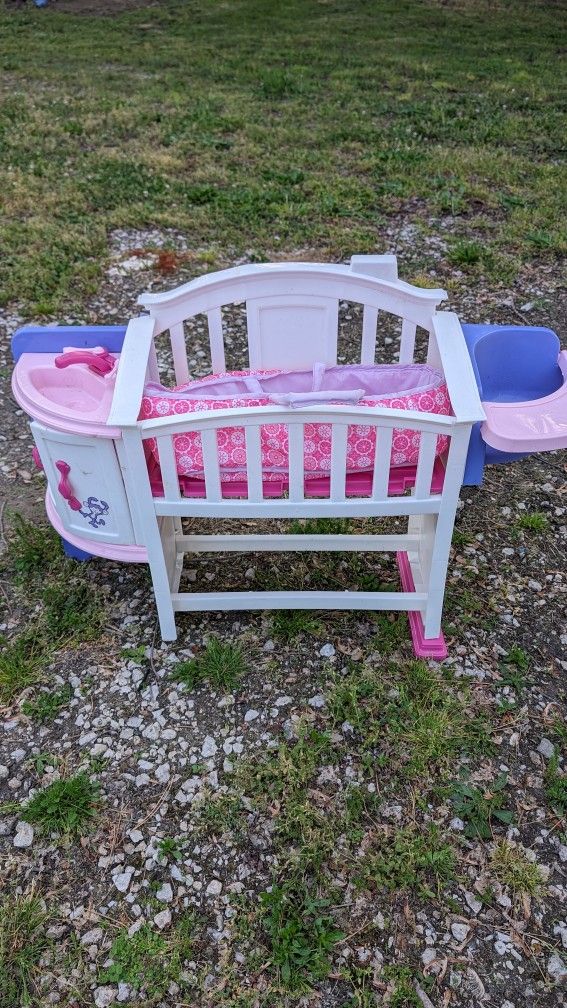 American Plastic Toys Baby Doll Nursery And Kitchen. Crib Bed, Sink, Cupboard, Highchair, Reg $49. $15 Baby Doll Carrier Cradle Added. East or West