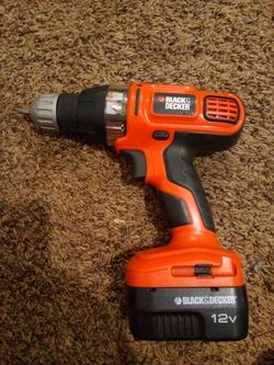 Black&Decker drill with charger and cordless battery pack