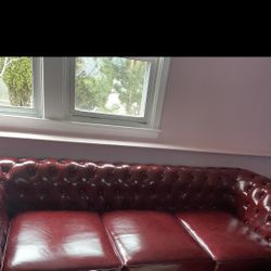 2 Red leather Couches 