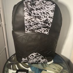 Spray ground backpack