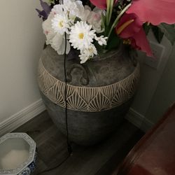 Vase with artificial flowers