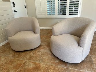 Four Boucle Swivel Accent Chairs
