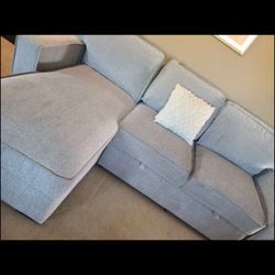 Grey Sectional Sleeper With Pull Out Into Futon And Storage Chaise