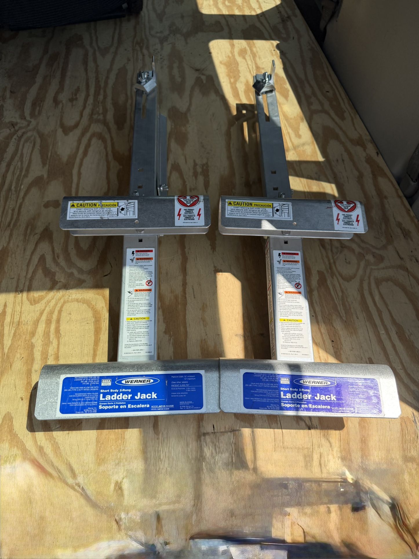 SET OF TWO WERNER LADDER JACKS IN EXCELLENT CONDITION.USE ONLY A FEW TIMES.$100.00 OR BEST OFFER.