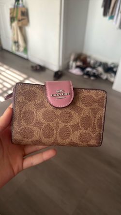 Pink and brown coach wallet