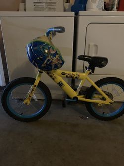 Minion bike and helmetMAKE AN OFFER MUST GO