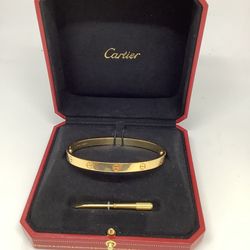 18kt yellow gold love bracelet Cartier COME TO OUR STORE WE HAVE THE PERFECT GIF. GOLD WATCHES PURSES AND MORE