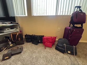 Michael Kors purses and suitcase